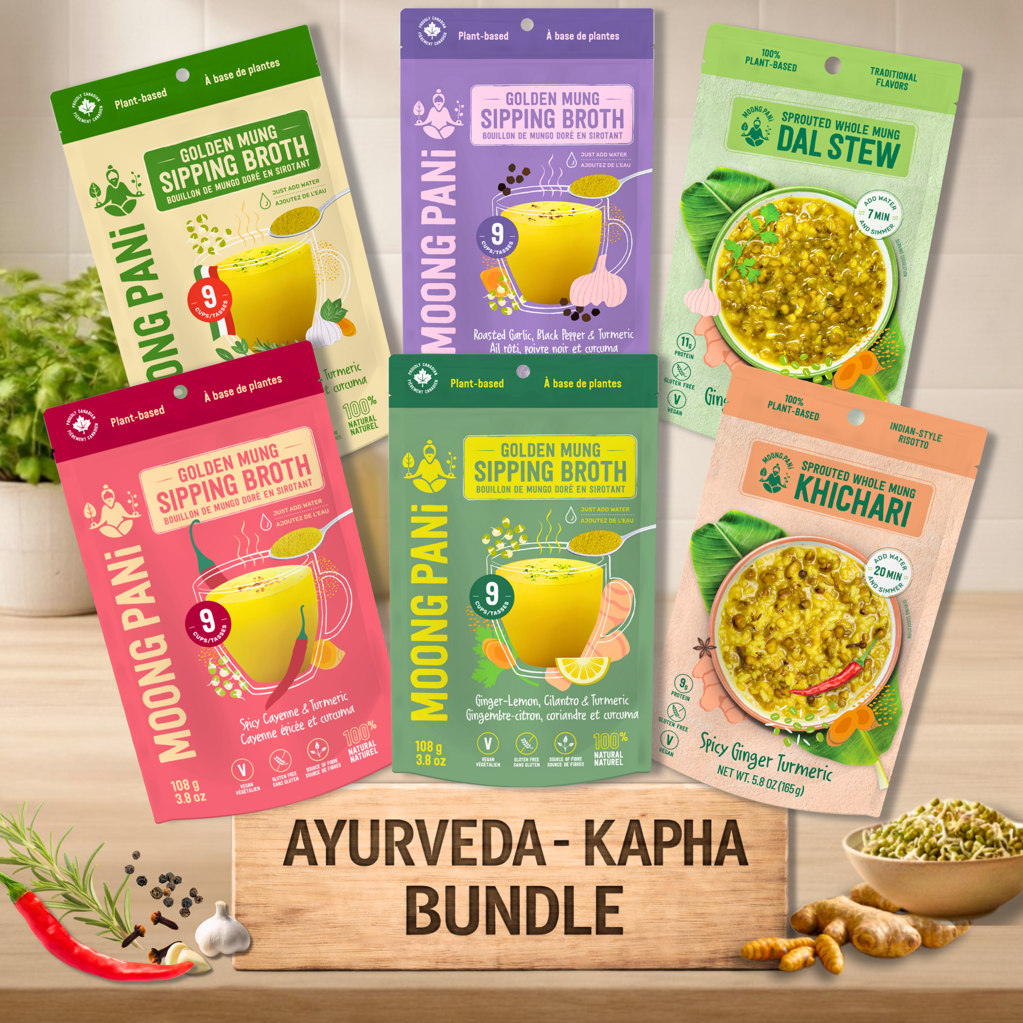Collection of Ayurveda Kapha Bundle packages of sprouted Mung broths, kitchari and dal on a wooden surface with ingredients.